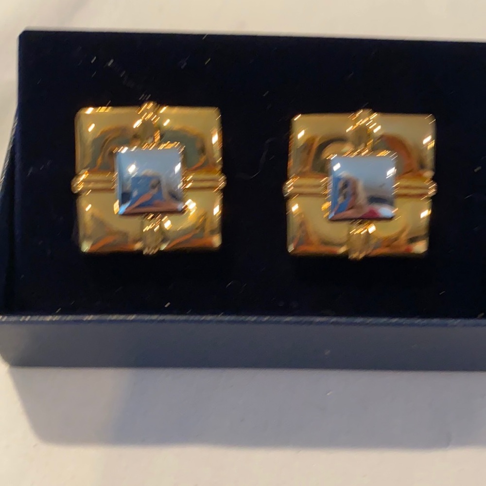 Never worn gold and silver tone clip on earrings from Personal Accents